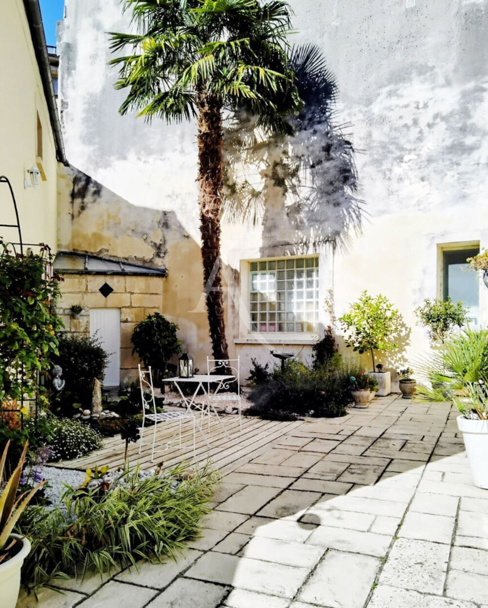 Vente Maison Ensemble immobilier constitué de deux maisons et son garage et extérieur  à Saint Jean D'Angely Saint jean d angely