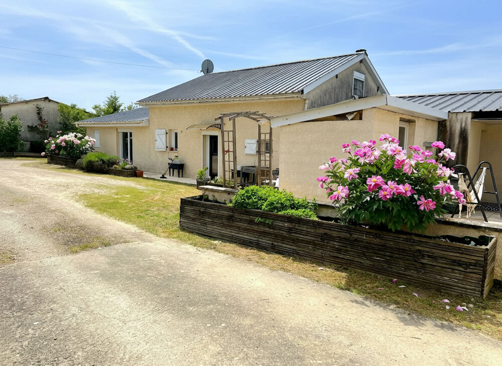 Maison et son hangar proche de toutes commodités