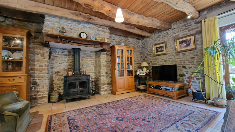 Vente Maison CÔTES D'ARMOR Charmante maison de 2 chambres avec garage et jardin, dans un environnement paisible et proche de la nature. Le mene