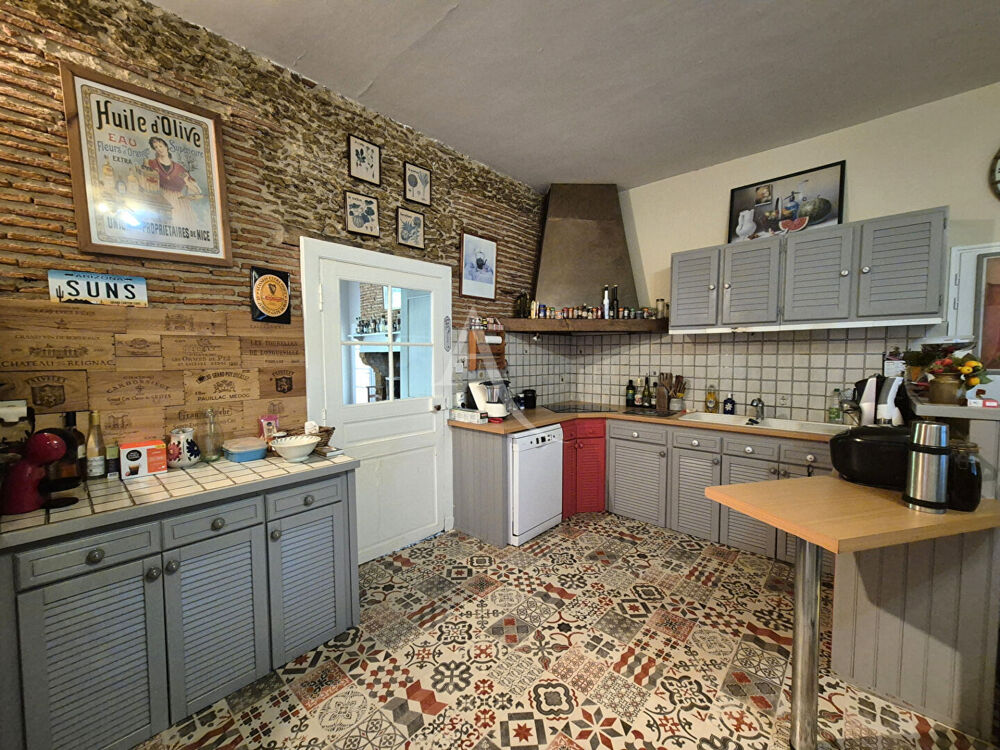 Maison de ville + T3 + local commercial