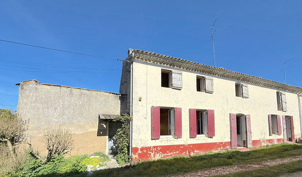 A VENDRE MAISON EN PIERRE AVEC JARDIN ET GARAGE - SECTEUR BLAYE - CARTELEGUES