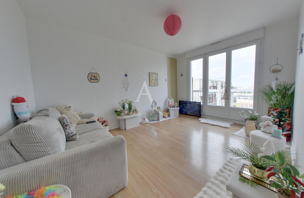 Appartement lumineux avec balcon, parking et cave