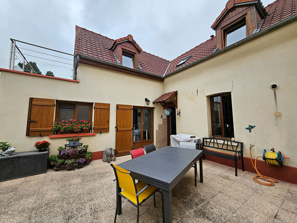 Maison familiale d'environ 103 m² avec jardin et garage