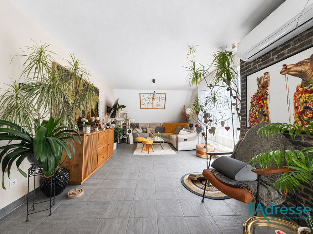 À vendre ? Duplex 4 pièces de 120 m² avec terrasse, garage et stationnements