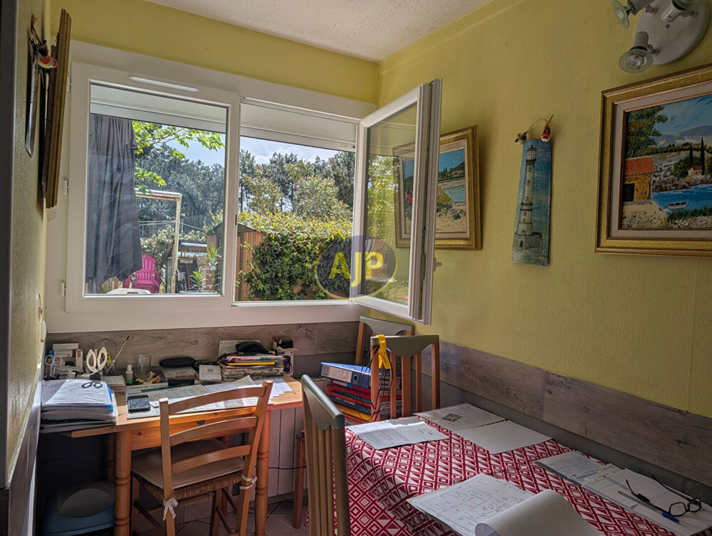 Appartement T2, jardinet et place de parking