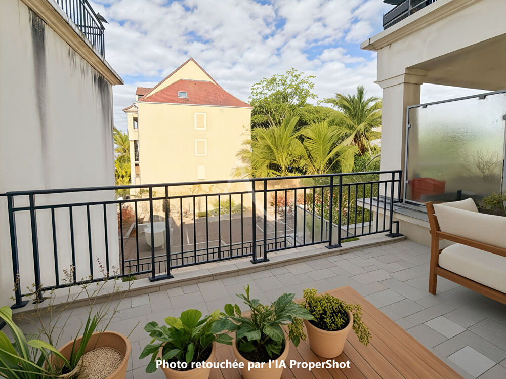 COEUR DE VILLE Appartement F3 de 67 m2 avec terrasse de 9 m2, 1 place de parking en sous-sol sol