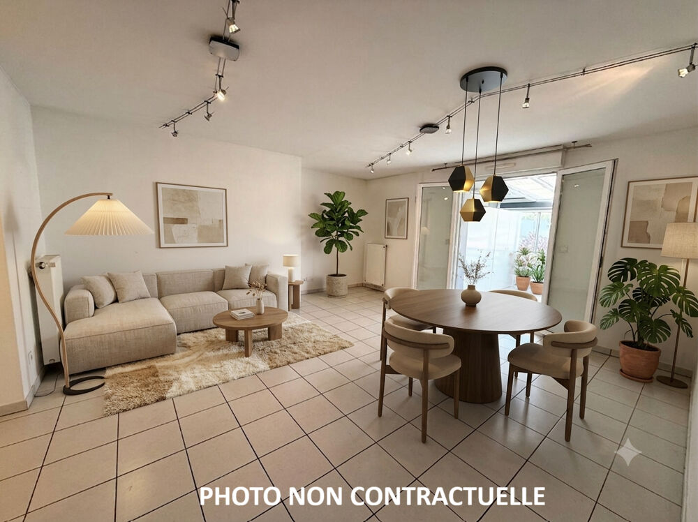 A vendre : Spacieux appartement avec véranda, cave, parking et garage à Roche-la-Molière