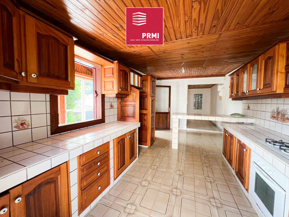 Maison de plain-pied 3 pièces à rénover avec terrain de 125 m² dans un environnement calme