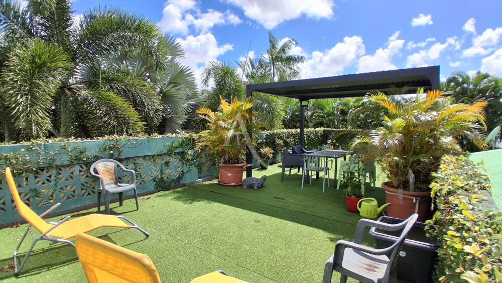 Un havre tropical avec rooftop : une maison unique !