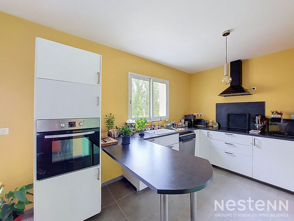 A Vendre Maison contemporaine de plain-pied avec trois chambres, garage et jardin à Condom