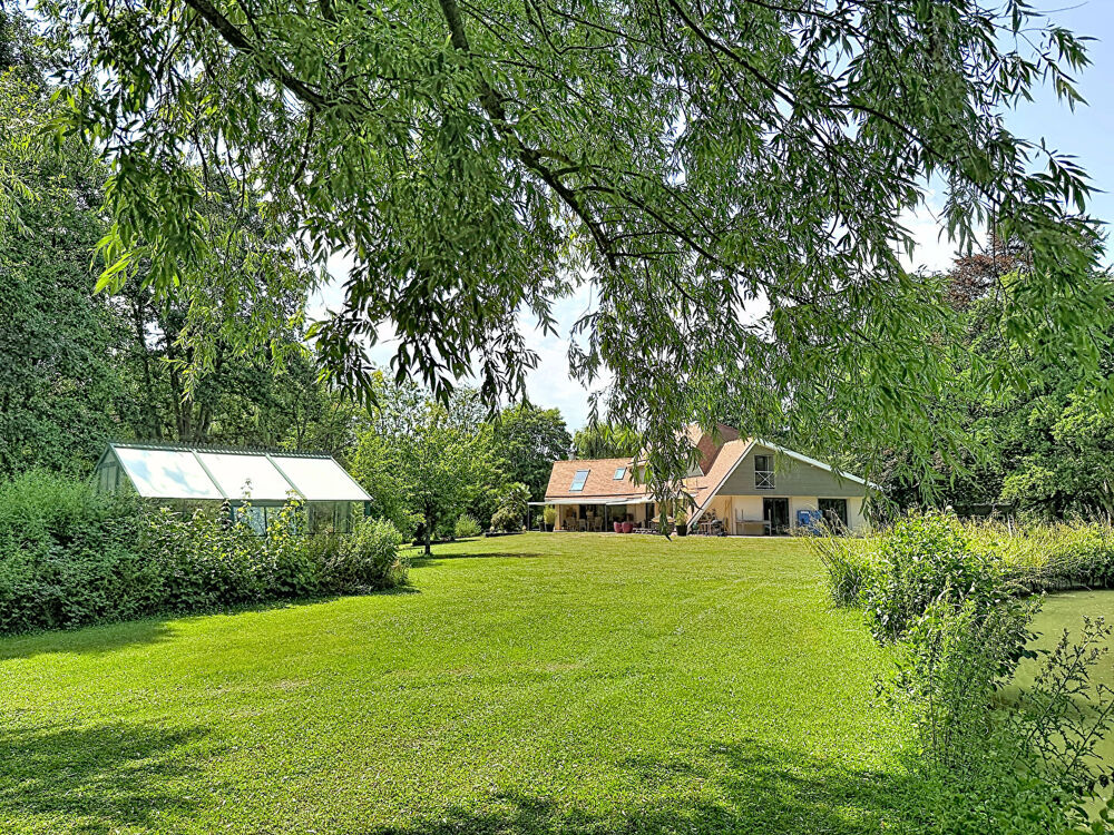 EXCLUSIVITE - THAON - Propriété de 275 m2 sur 9 000 m2 de terrain avec étang