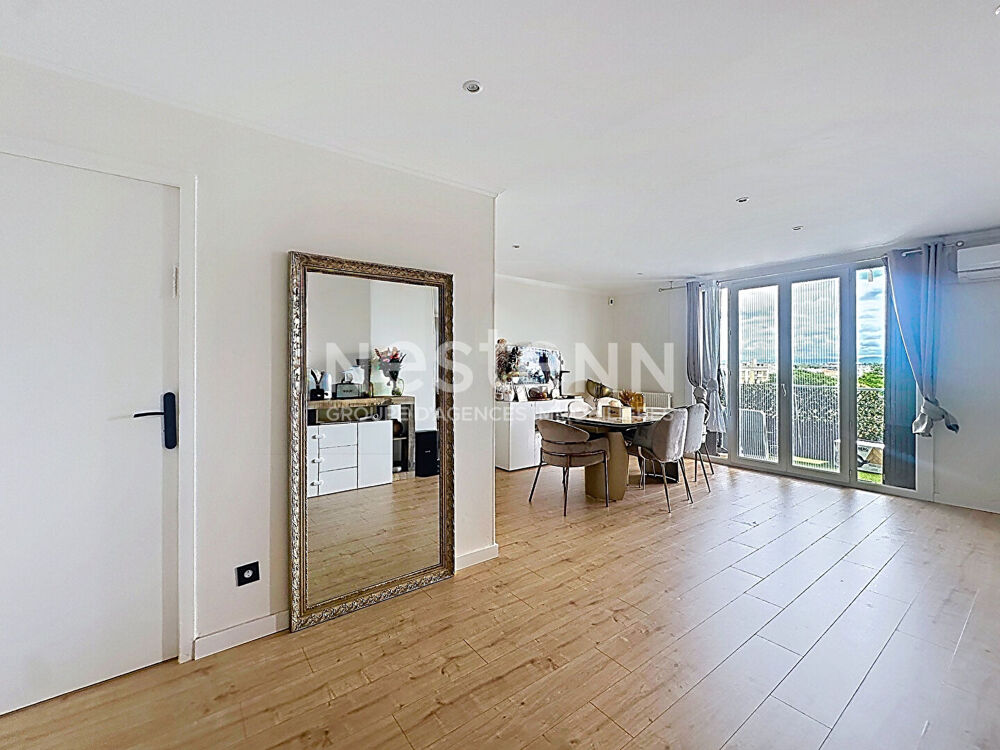 Appartement lumineux 4 pièces 3 chambres avec balcon et cave - 69500 BRON