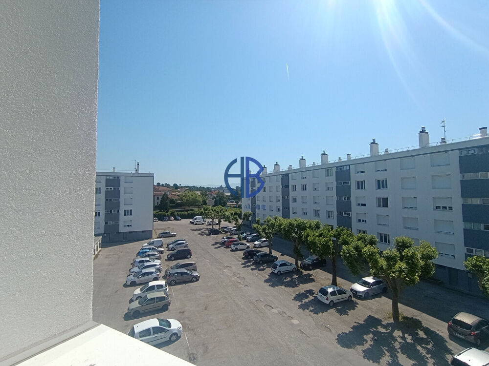 Appartement type 4, cave et garage et place de parking