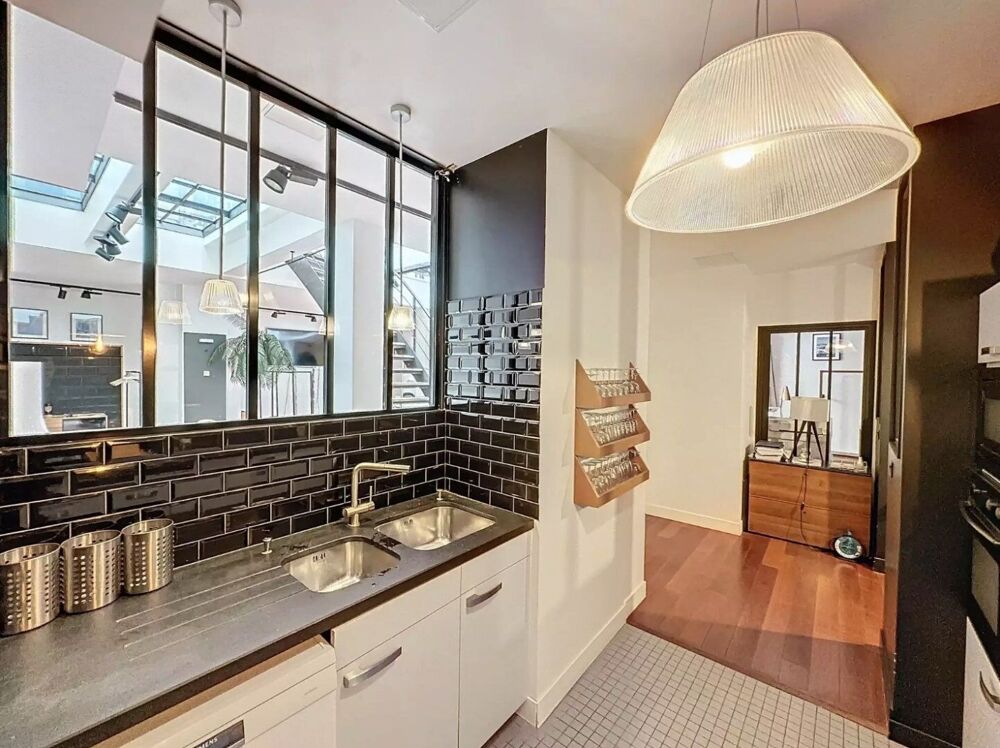 Vente Appartement Paris10. A deux pas des Folies Bergère - Loft d'exception sous verrière, au calme sur cour pavée. Paris 10