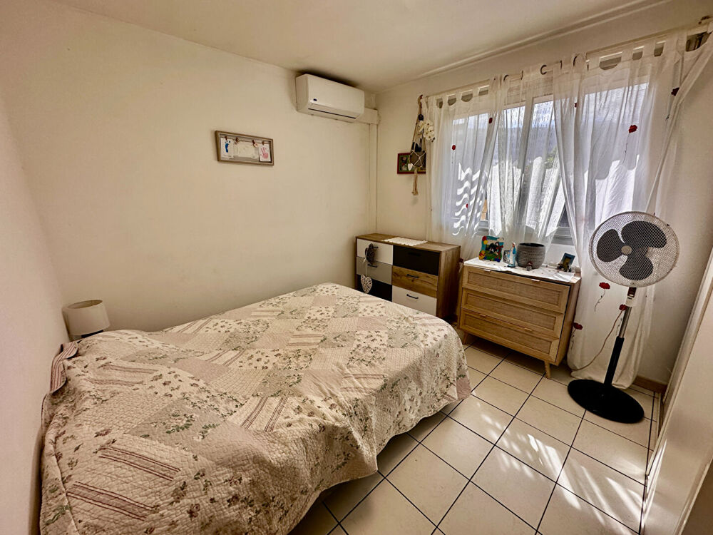 Appartement T2 à 50 m du lagon de Trou d'Eau - Accès direct plage et parking sécurisé