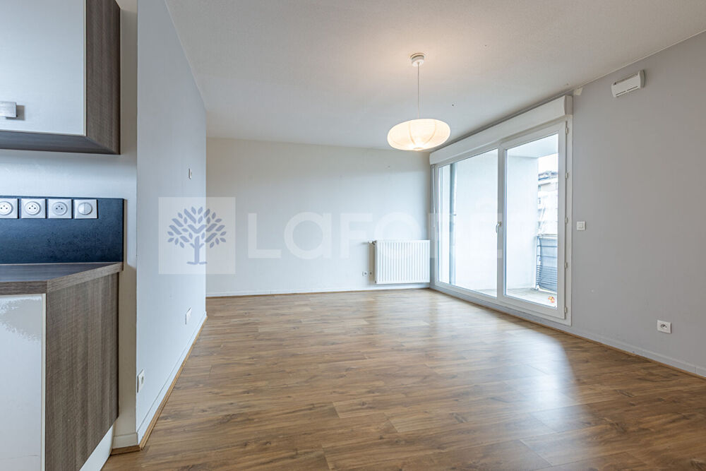 AGENCE IMMOBILIERE LAFORET - "CAREX" - ANNECY - SEYNOD - APPARTEMENT TRAVERSANT T3 de 68m² - CAVE - BALCON