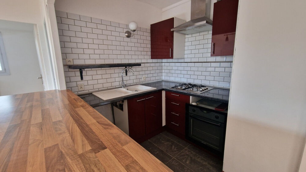 Appartement 4 pièces de 69 m² ,box + cave en centre ville de MANTES LA VILLE