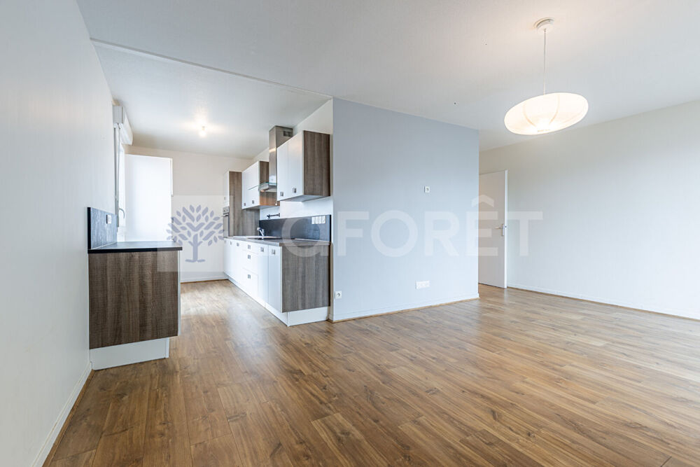 AGENCE IMMOBILIERE LAFORET - "CAREX" - ANNECY - SEYNOD - APPARTEMENT TRAVERSANT T3 de 68m² - CAVE - BALCON