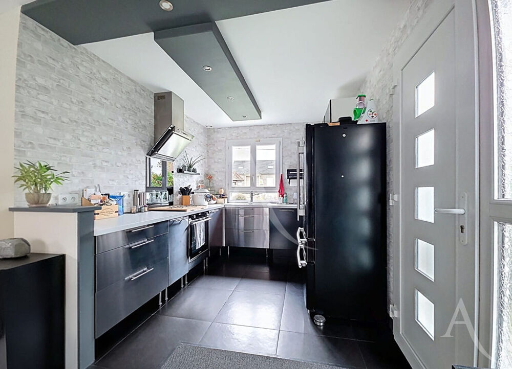 Maison de plain-pied 4 pièces avec sous-sol total et terrain de 650 m² à Rosny-sur-Seine
