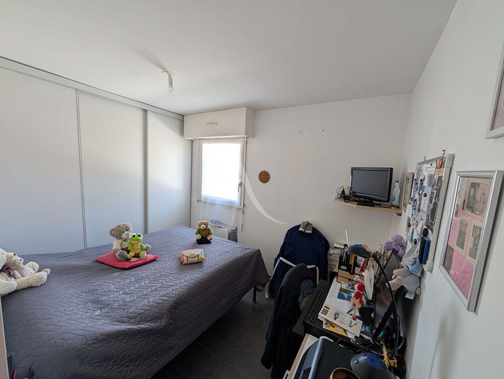 Appartement T2 avec locataire en place - Résidence sécurisée avec ascenseur, parking et cave