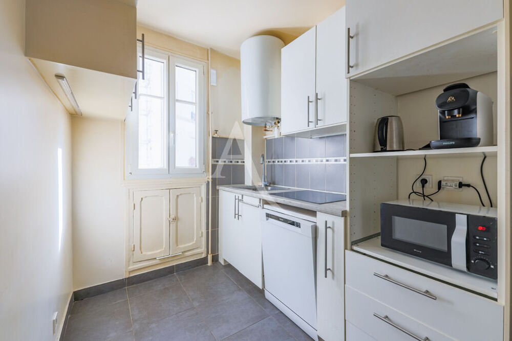 Vente Appartement Abbesses Place Émile Goudeau - 2 Pièces 60 M² - Immeuble Pierre, Brique & Ascenseur Paris 18