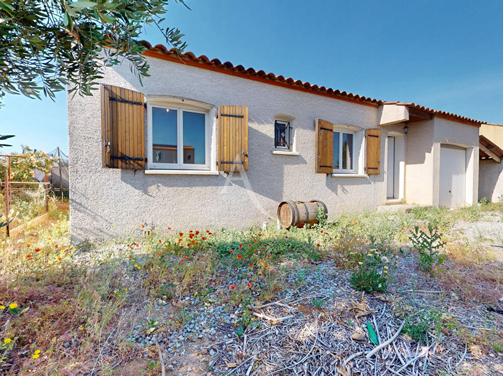 Maison 4 faces plain pied avec jardin et garage à Paraza