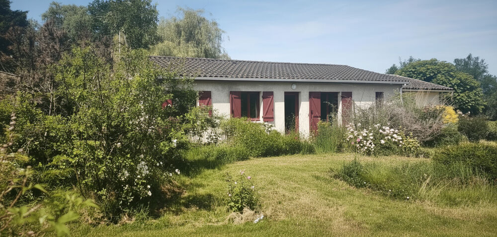 Maison individuelle récente avec garage et magnifique terrain arboré de 2000 m²