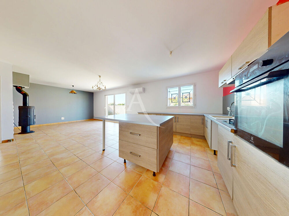 Maison 4 faces plain pied avec jardin et garage à Paraza