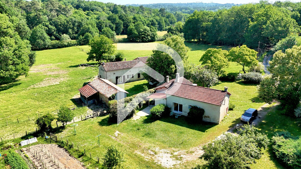 Propriété rare de 2 maisons avec 6 hectares, grange étang et puits