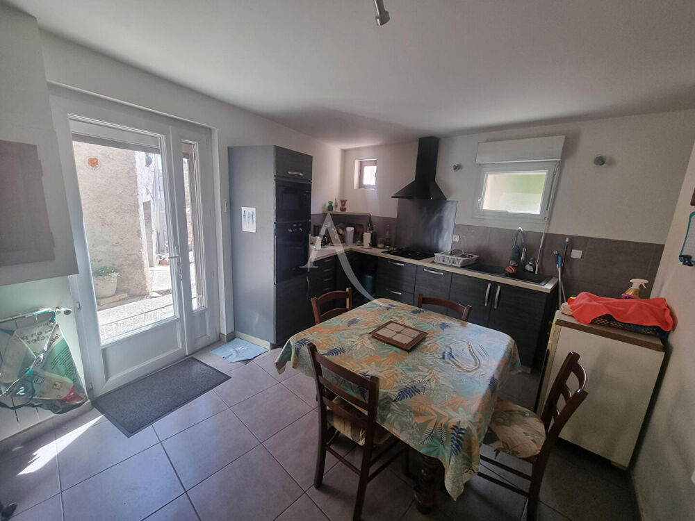Maison Gardie et terrain pas attenant constructible