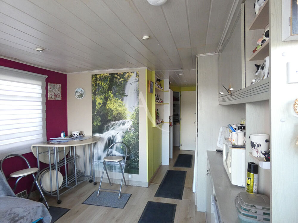 Terrain de 1 000 m² avec Mobil home, 2 hangars Outarville