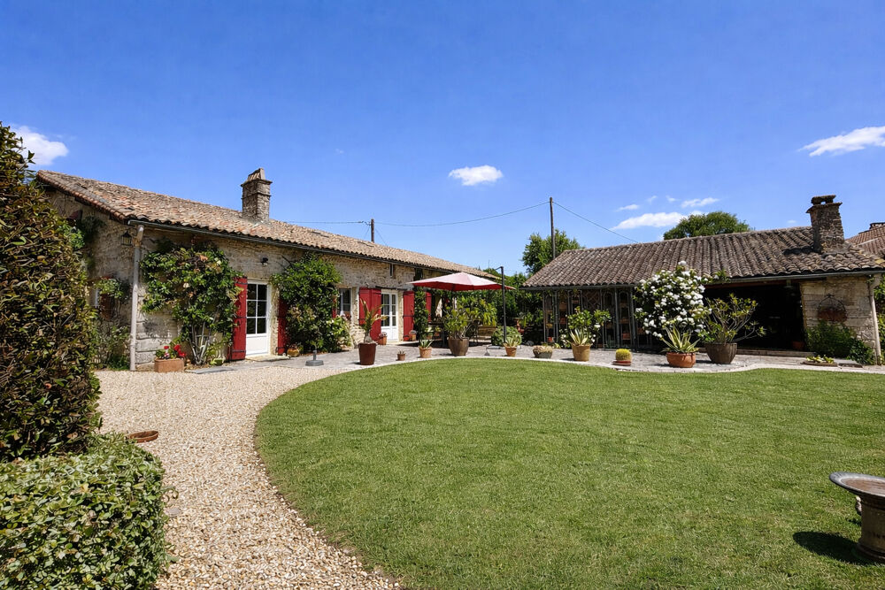 Longère magnifiquement restaurée avec de superbes jardins