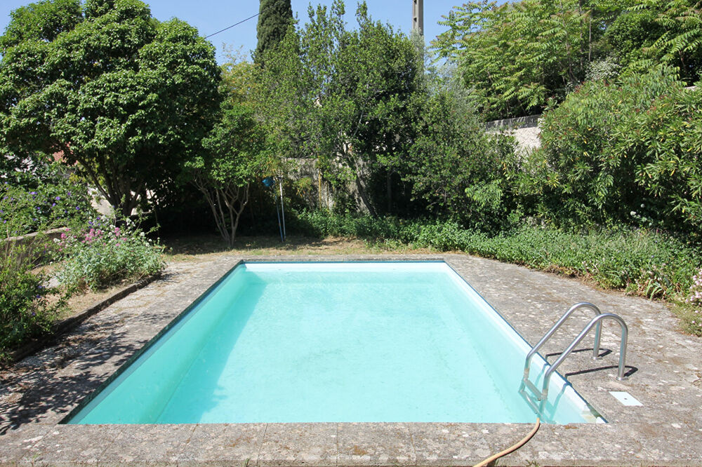 NIMES Belle maison d'architecte signée Armand PELLIER de 1962 de type 5 d'environ 104,87m² avec terrain arboré et piscine