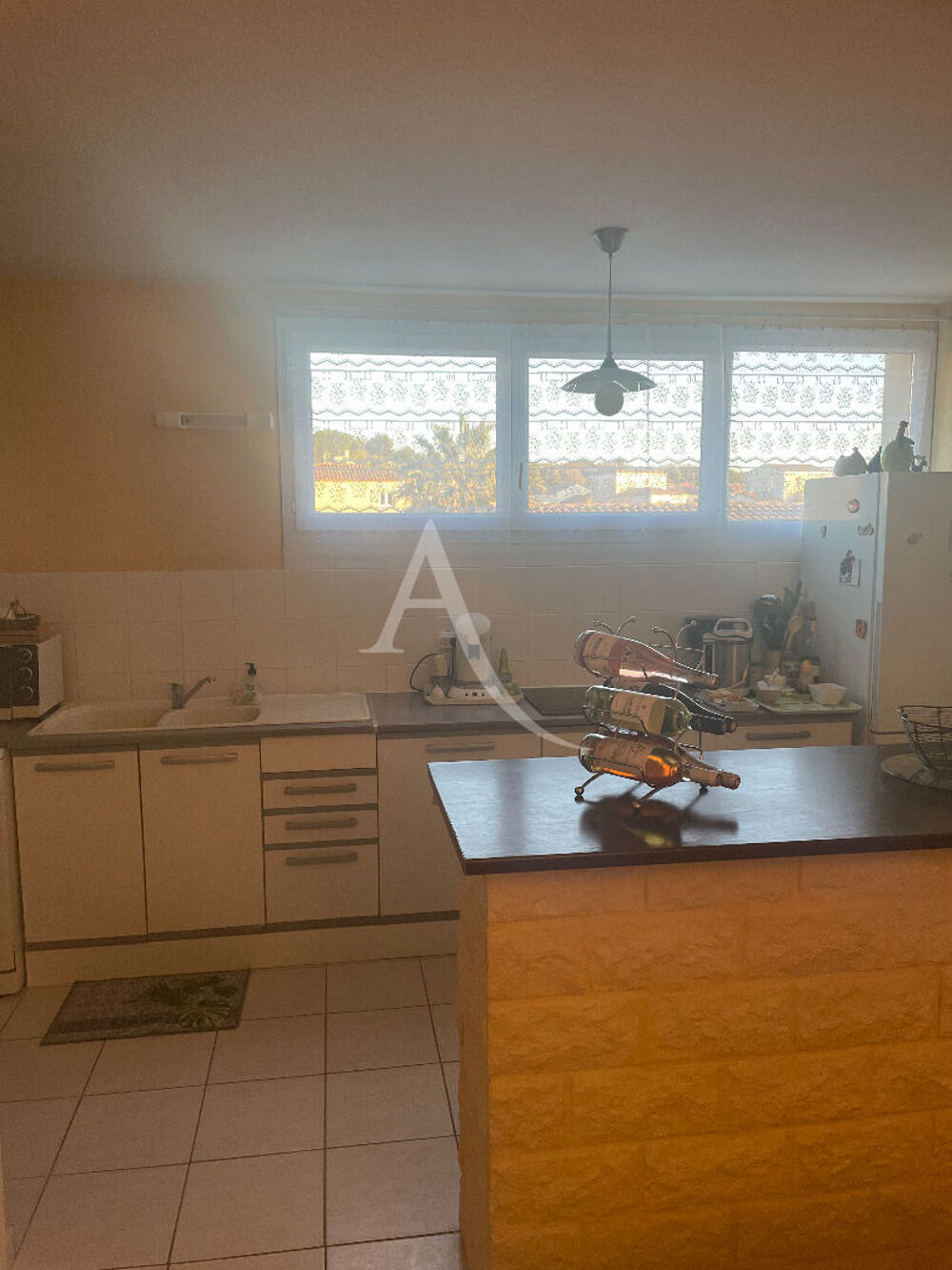 Vente Appartement Vauvert T3 actuellement loué avec terrasse et garage Vauvert