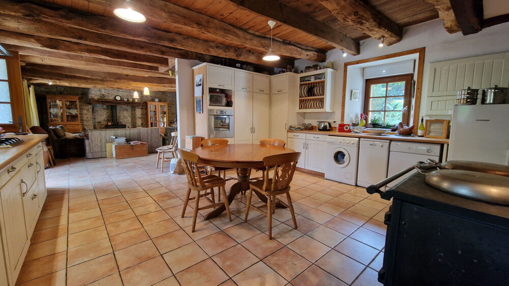 Vente Maison CÔTES D'ARMOR Charmante maison de 2 chambres avec garage et jardin, dans un environnement paisible et proche de la nature. Le mene