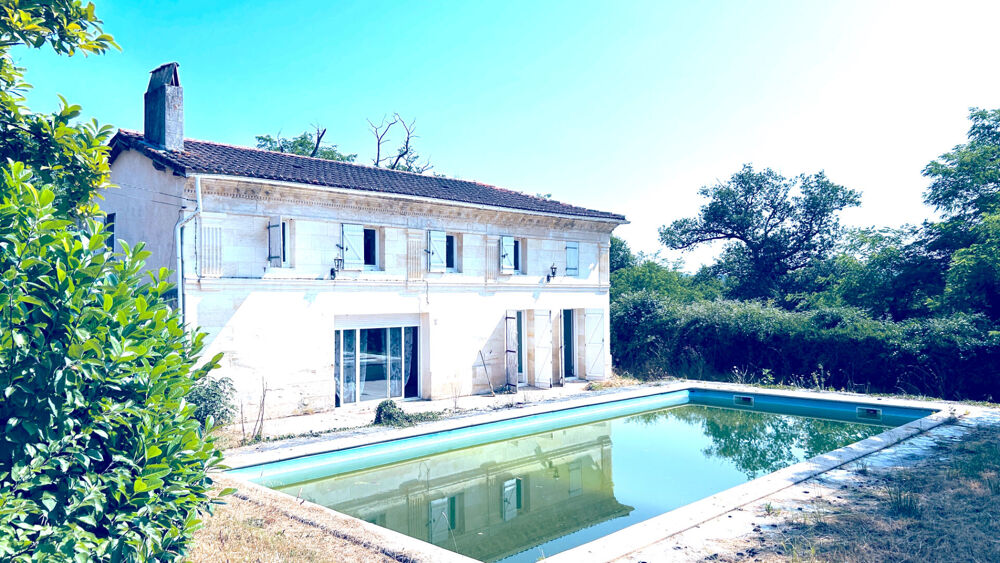 A VENDRE MAISON EN PIERRE AVEC TERRAIN ET ETANG - SECTEUR COUTRAS
