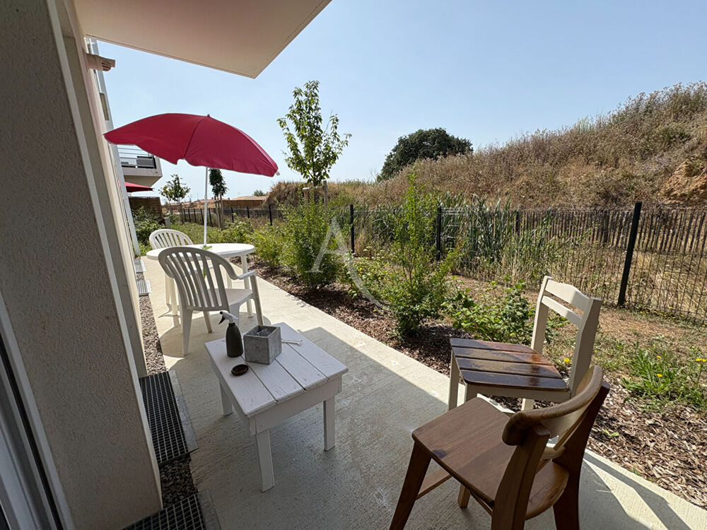 Appartement T3 avec terrasse, cave et double stationnement