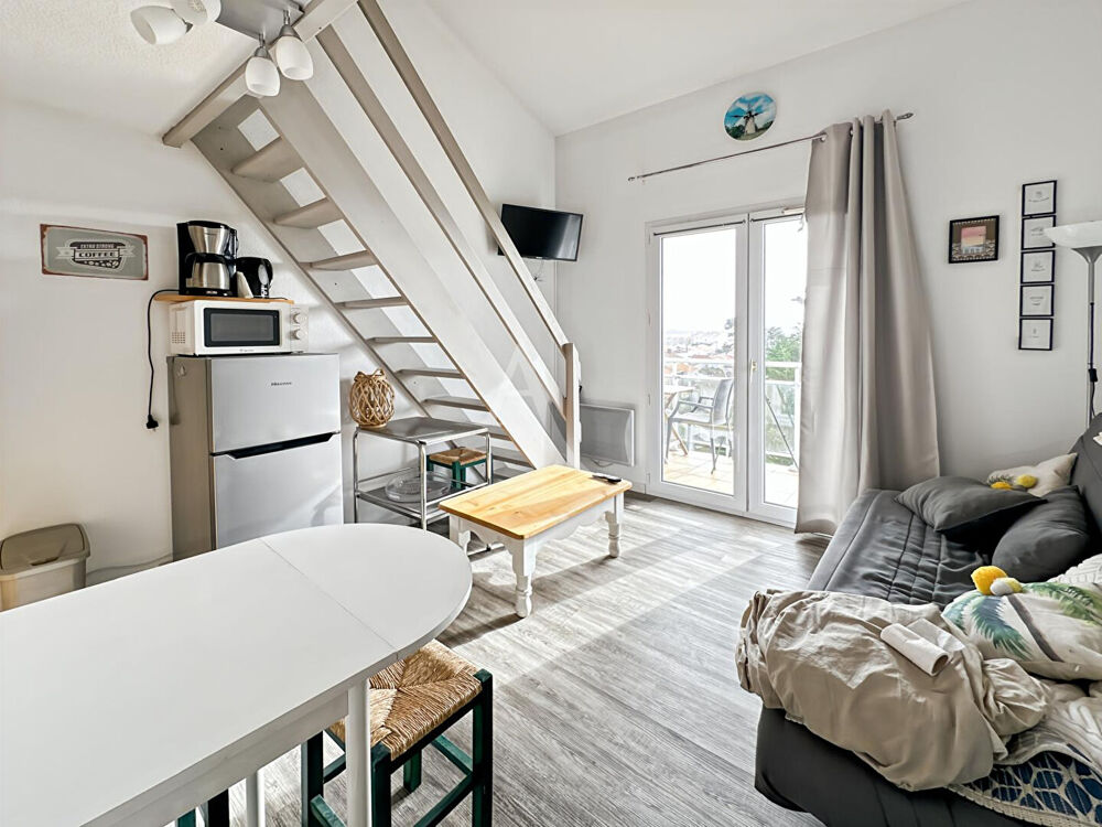 Studio mezzanine rénové - vue latérale sur l'océan