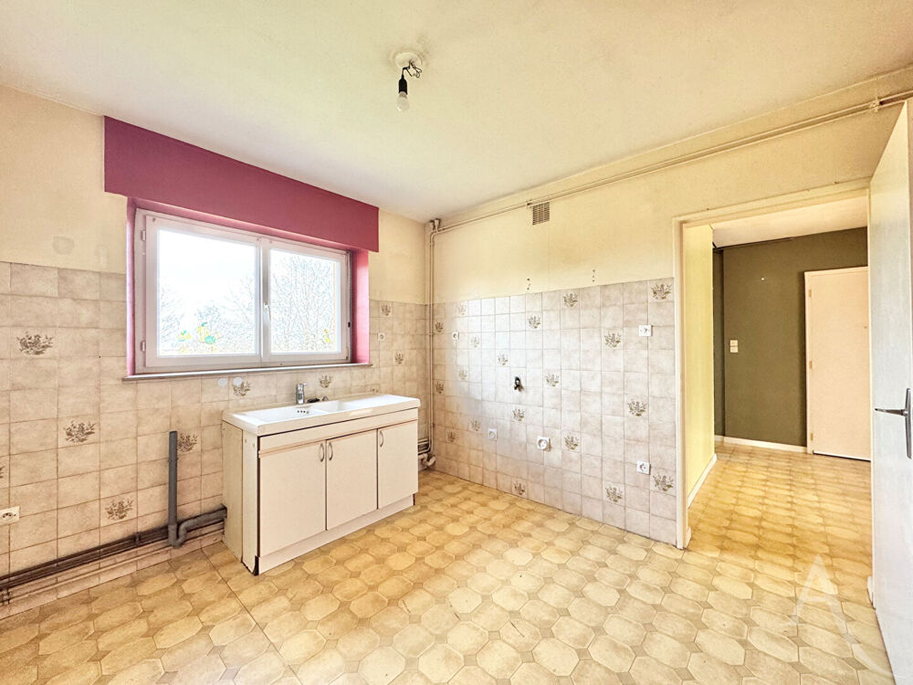 Spacieux T4 avec son garage, ses balcons, son jardin et sa cave