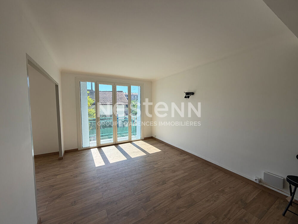 Appartement T4 63m² au 1er étage - Double séjour, 2 balcons et cave