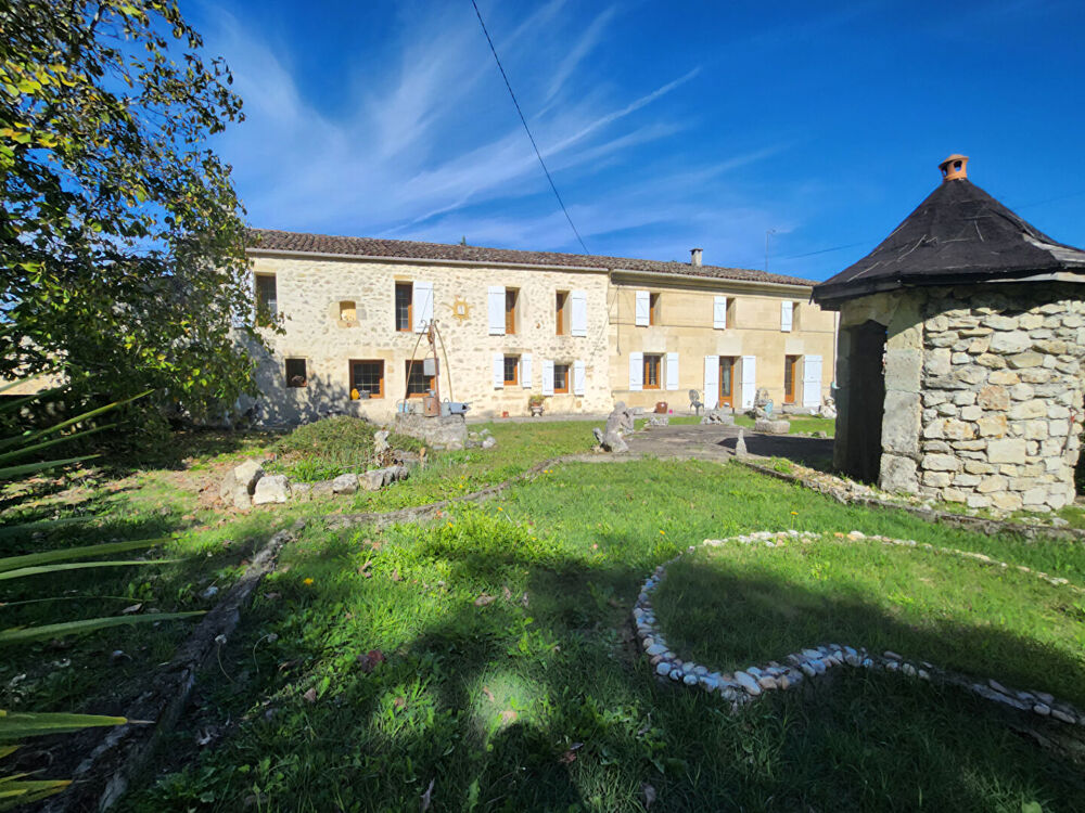 OPPORTUNITÉ - VIAGER OCCUPE, maison en pierre de 196 m2 et dépendances sur jardin