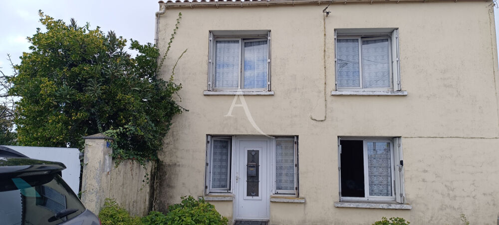 MAISON A RENOVER AVEC GARAGE ET BEAU TERRAIN