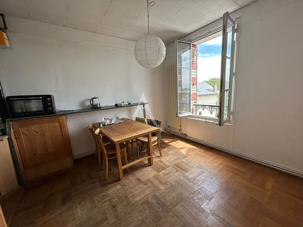 APPARTEMENT AVEC 2 CAVES ET UNE DEPENDANCE