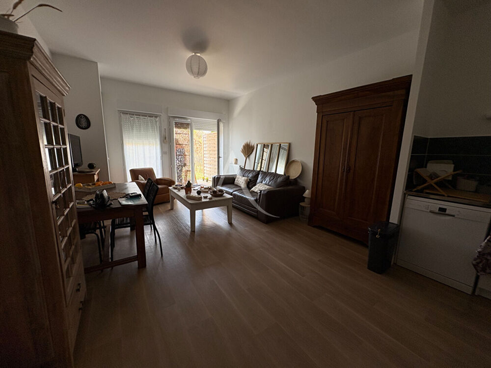 Appartement T3 avec terrasse, cave et double stationnement