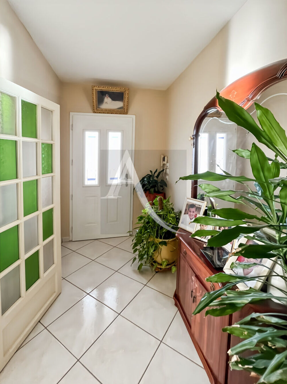 A vendre maison plain-pied, double garage, quatre chambres;