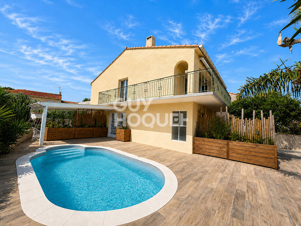 Villa constituée de trois appartements, piscine et garage.