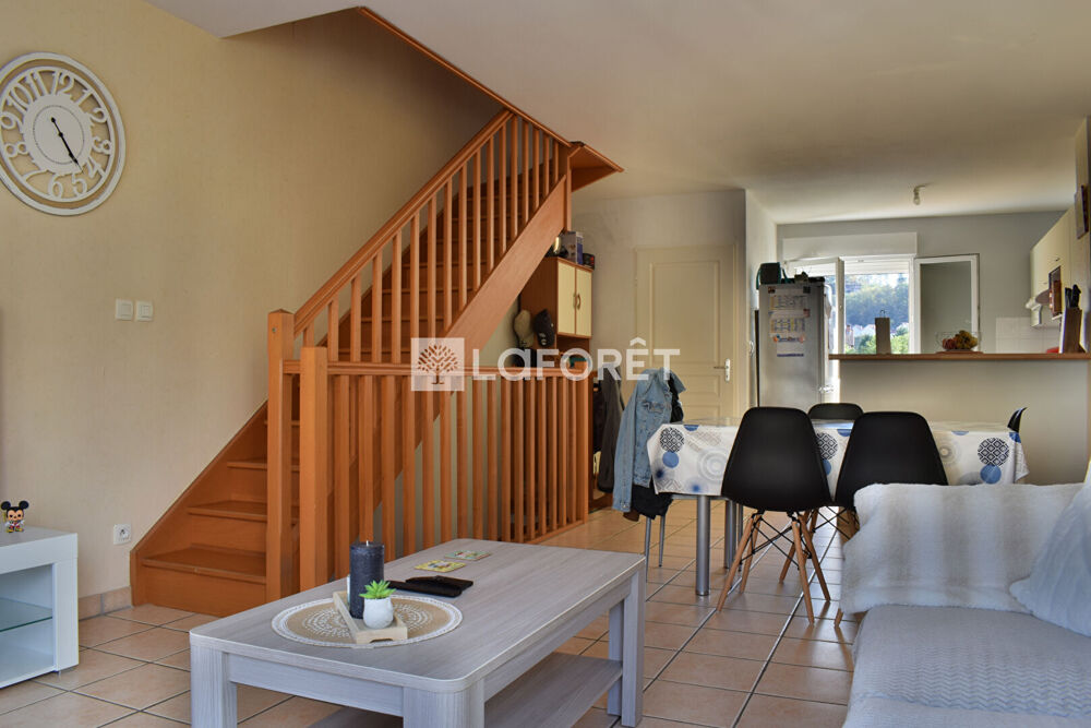 Maison en copropriété avec jardin privatif