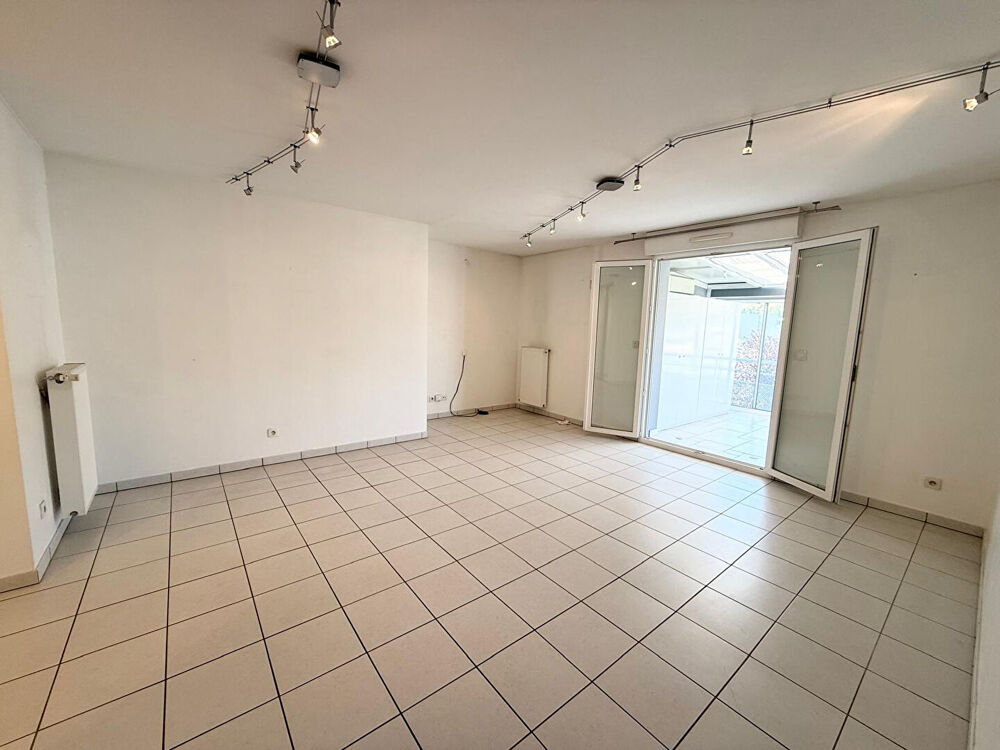 A vendre : Spacieux appartement avec véranda, cave, parking et garage à Roche-la-Molière