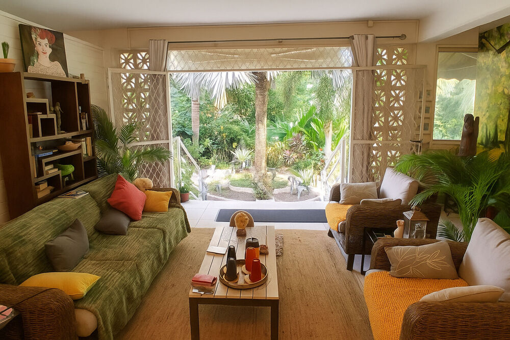 Un havre tropical avec rooftop : une maison unique !