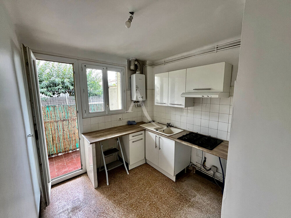 Appartement 3 pièces 51.57 m2 traversant parking et cave!